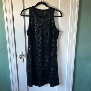 Black woman’s sequenced dress. Size L right above knee if you are at least 5’7.